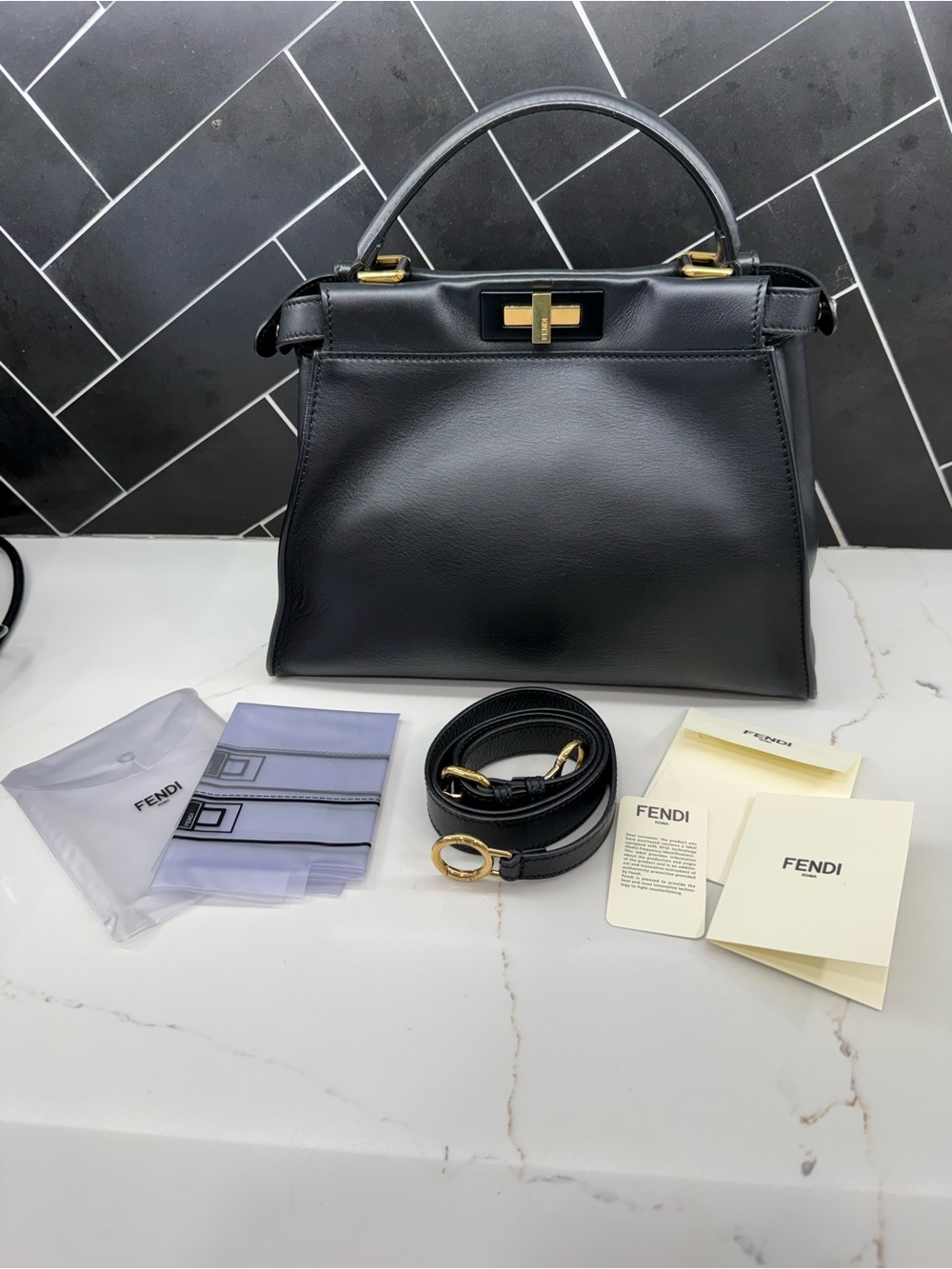 FENDI Vitello Seta Shiny Nappa Medium Peekaboo Satchel in great used condition.